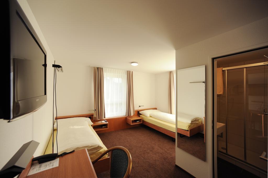 Hotel Freihof Swiss Lodge Унтерегери Номер фото